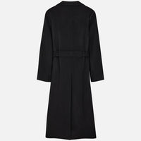 Our double-breasted, buttonless and belted overcoat in a forever classic, black luxurious cashmere and wool blend. PALLAS PARIS